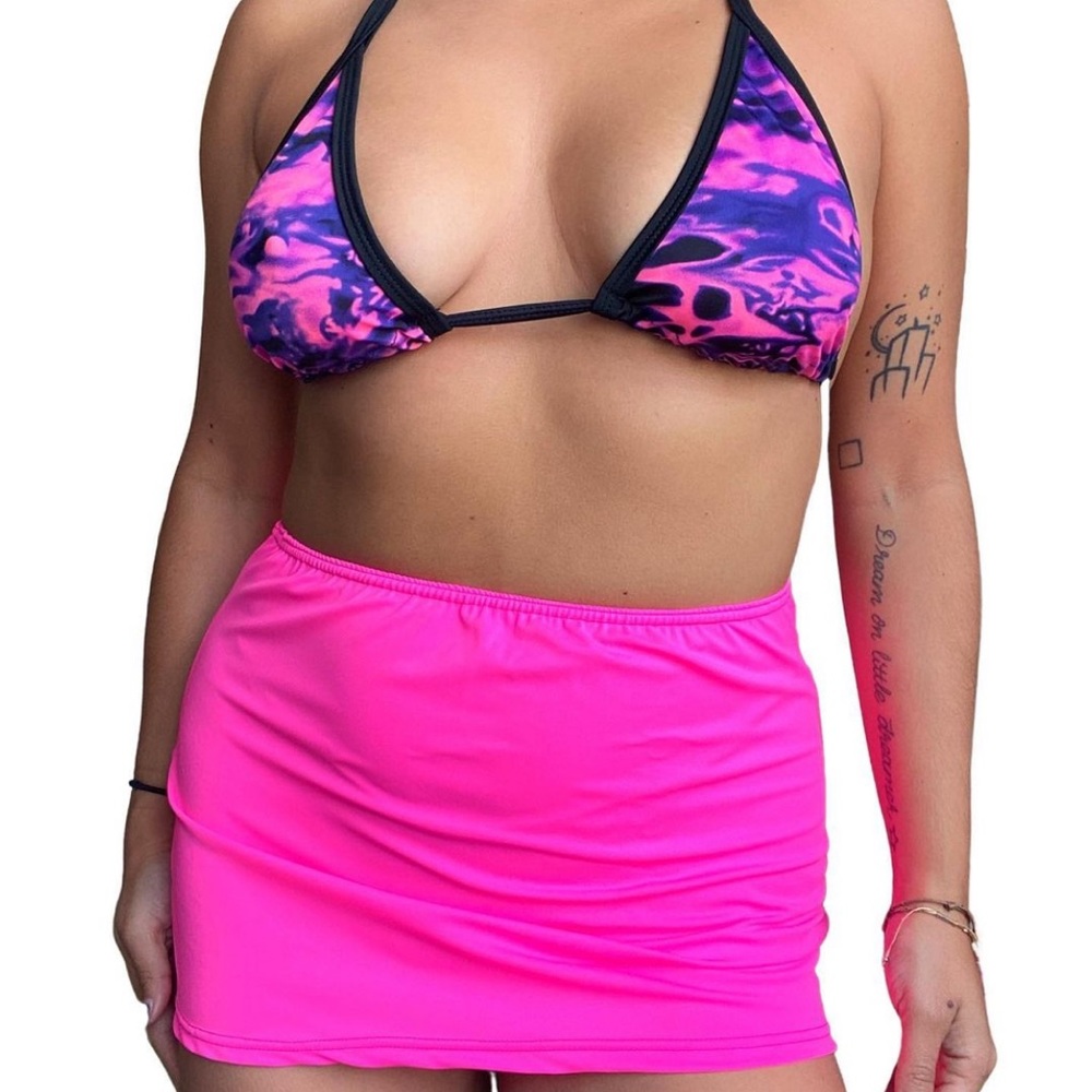 Never worn Rave with migente bikini top and skirt set